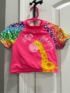 Wippette hot pink with giraffe short sleeve swim top 3T small mark on back